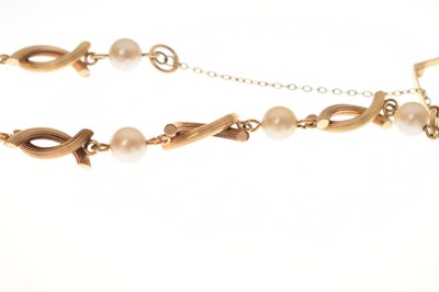 Lot 47 - Pearl yellow metal fancy link bracelet