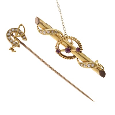 Lot 44 - Victorian ruby and seed pearl 15ct gold bar brooch, and a seed pearl horseshoe pearl stick pin
