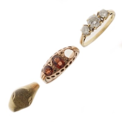 Lot 29 - Early 20th century garnet 9ct rose gold ring, a cubic zirconia three-stone 9ct gold ring, and a 9ct gold signet ring (3)