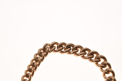 Lot 41 - Late Victorian yellow metal (9ct) 'rose gold' watch Albert chain with fob
