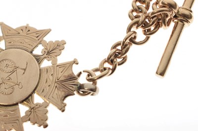 Lot 41 - Late Victorian yellow metal (9ct) 'rose gold' watch Albert chain with fob