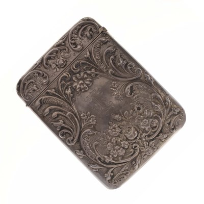 Lot 144 - Edward VII silver visiting card case with embossed foliate decoration