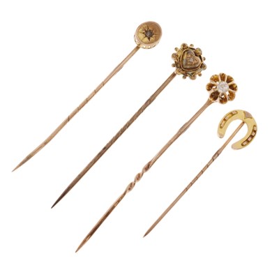 Lot 41 - Four antique stick pins