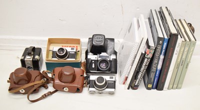 Lot 278 - Four vintage cameras and a collection of photographic books