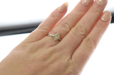 Lot 1 - Marquise diamond white metal solitaire ring with accompanying certificate