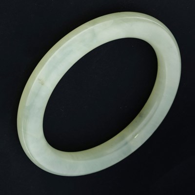 Lot 230 - Chinese celadon jade bangle