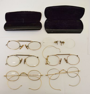 Lot 215 - Collection of vintage spectacles to include gold-plated and yellow metal rimmed examples