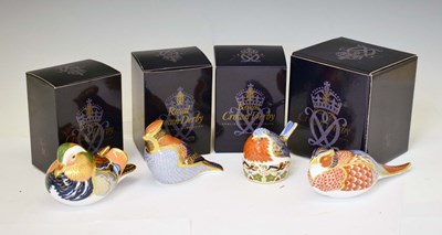 Lot 523 - Royal Crown Derby - Four bird paperweights