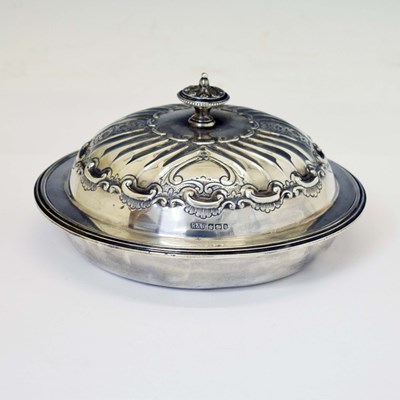 Lot 179 - Late Victorian silver muffin dish, the doomed lid with Rococo decoration