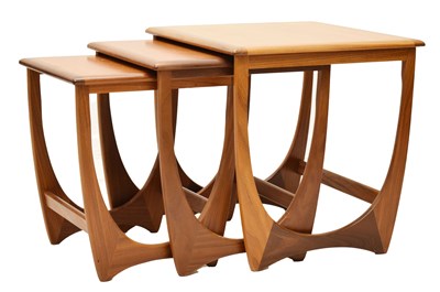 Lot 786 - Victor B. Wilkins for G-Plan - Mid century nest of three teak 'Astro' design coffee tables