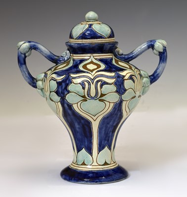 Lot 325 - Della Robbia Pottery – Twin-handled covered vase dated 1900