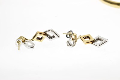 Lot 69 - Diamond 18ct yellow and white gold suite comprising necklace, bracelet, and earrings