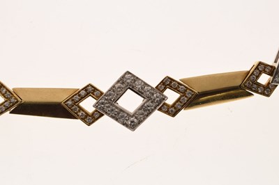 Lot 69 - Diamond 18ct yellow and white gold suite comprising necklace, bracelet, and earrings