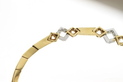 Lot 69 - Diamond 18ct yellow and white gold suite comprising necklace, bracelet, and earrings