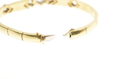 Lot 69 - Diamond 18ct yellow and white gold suite comprising necklace, bracelet, and earrings