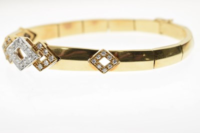 Lot 69 - Diamond 18ct yellow and white gold suite comprising necklace, bracelet, and earrings