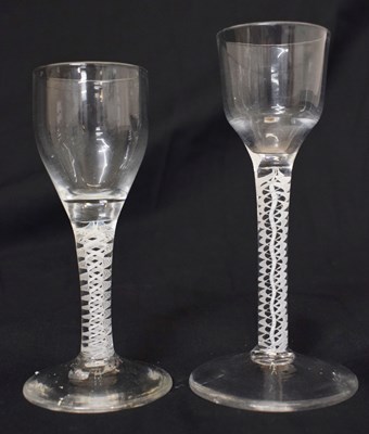 Lot 467 - Two opaque twist stem wine or cordial glasses