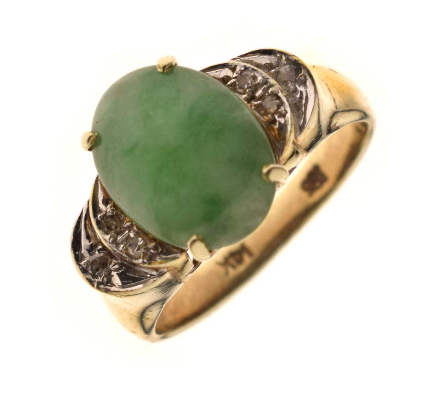 Lot 29 - Jade and diamond 14k yellow and white metal ring