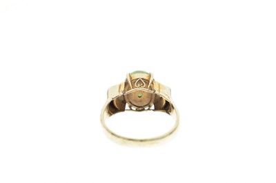 Lot 29 - Jade and diamond 14k yellow and white metal ring