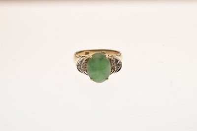Lot 29 - Jade and diamond 14k yellow and white metal ring