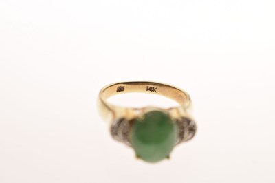 Lot 29 - Jade and diamond 14k yellow and white metal ring