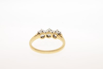 Lot 1 - Three stone diamond 18ct gold ring