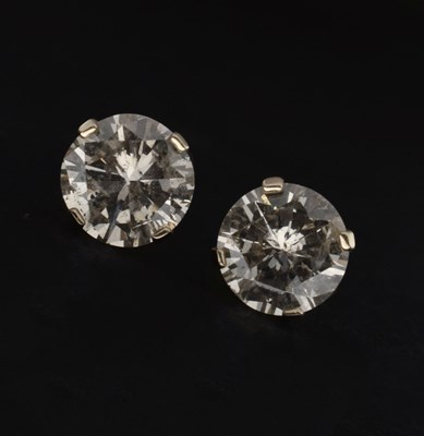 Lot 96 - Champagne diamond 14ct yellow gold solitaire earrings
