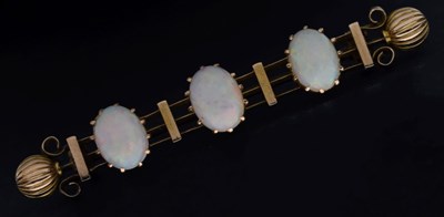 Lot 49 - Late 19th/early 20th century opal unmarked yellow metal bar brooch