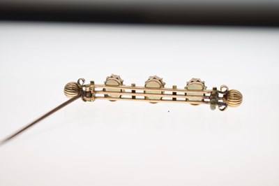 Lot 49 - Late 19th/early 20th century opal unmarked yellow metal bar brooch