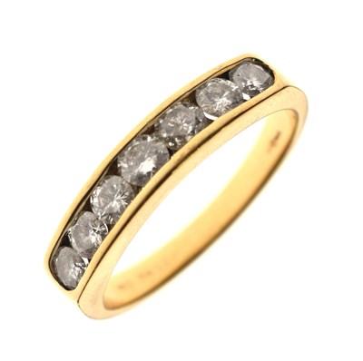 Lot 8 - Diamond seven stone half eternity 18ct gold ring