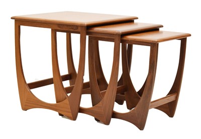 Lot 784 - Victor B. Wilkins for G-Plan - Mid century nest of three teak 'Astro' design coffee tables