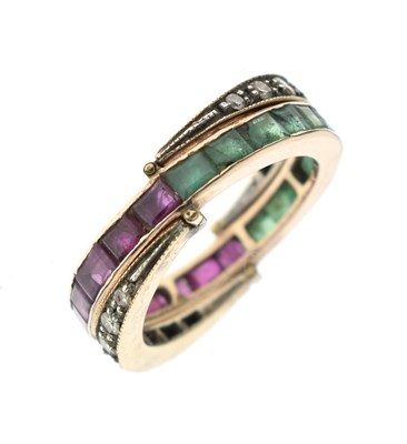 Lot 18 - 'Day and night' ruby, emerald and diamond yellow metal ring
