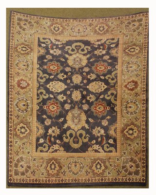 Lot 713 - Machine-made Persian-style rug