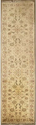 Lot 706 - Machine made cream ground wool runner