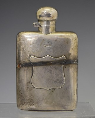 Lot 141 - Late Victorian silver hip flask with vacant shield cartouche