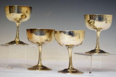 Lot 284 - Set of four Victorian silver toasting goblets or champagne coupes
