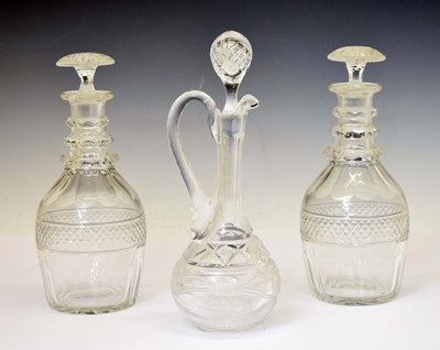 Lot 447 - Pair of Georgian style three-ring glass decanters and a cut glass claret jug