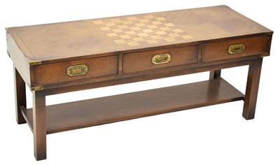 Lot 606 - Reproduction mahogany campaign style chessboard coffee table
