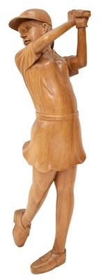 Lot 383 - Golf Interest - Large modern carved wooden figure of a female golfer
