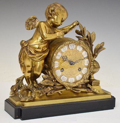 Lot 531 - Reproduction French style gilt metal 'putto' mantel clock