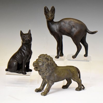 Lot 362 - Three assorted cast animal figures - dog, lion, and Egyptian style cat