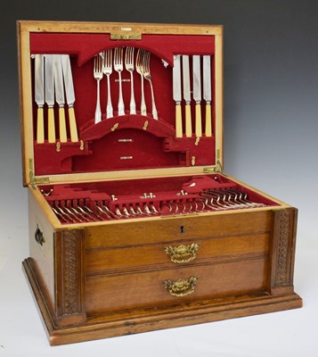 Lot 386 - Early 20th century oak canteen of silver plated cutlery for twelve settings