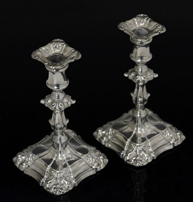 Lot 175 - Pair of late Victorian silver tapersticks in the mid 18th century taste