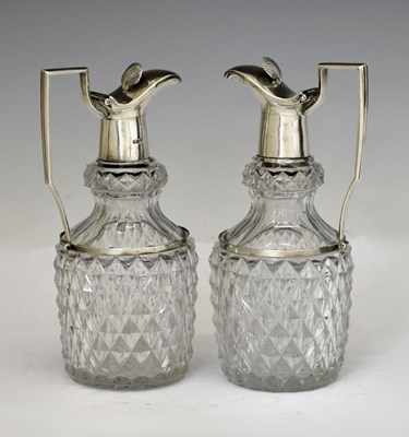 Lot 165 - Pair of George III silver-mounted cut glass bottles