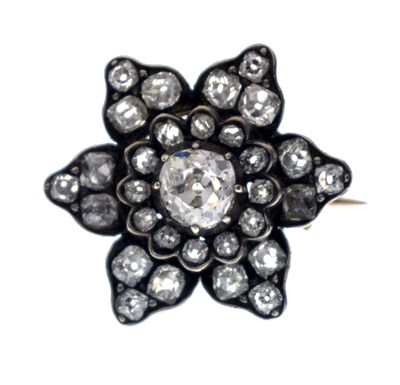 Lot 36 - Late 19th century diamond unmarked yellow and white metal flower head brooch