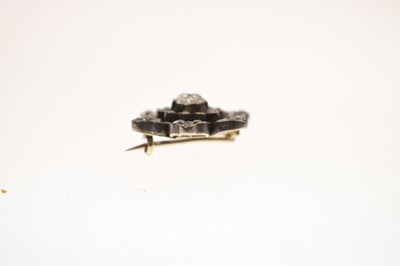 Lot 36 - Late 19th century diamond unmarked yellow and white metal flower head brooch
