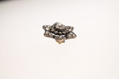 Lot 36 - Late 19th century diamond unmarked yellow and white metal flower head brooch