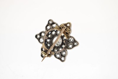 Lot 36 - Late 19th century diamond unmarked yellow and white metal flower head brooch