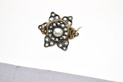 Lot 36 - Late 19th century diamond unmarked yellow and white metal flower head brooch