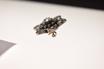 Lot 36 - Late 19th century diamond unmarked yellow and white metal flower head brooch